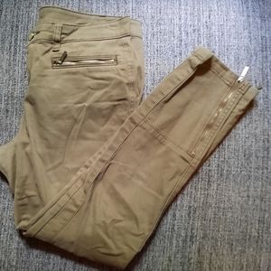 [Michael Kors] Olive green zip ankle moto skinny jeans.